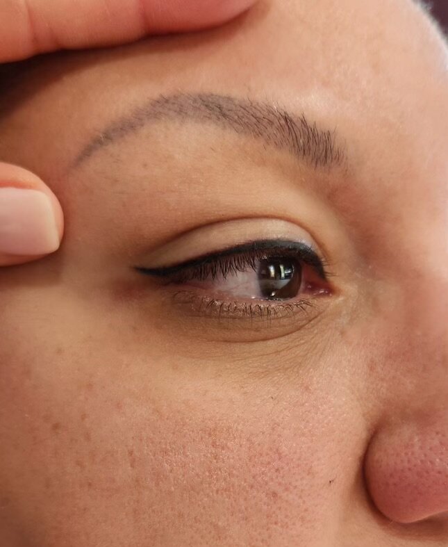 Lash line enhancement with softly shaped brows