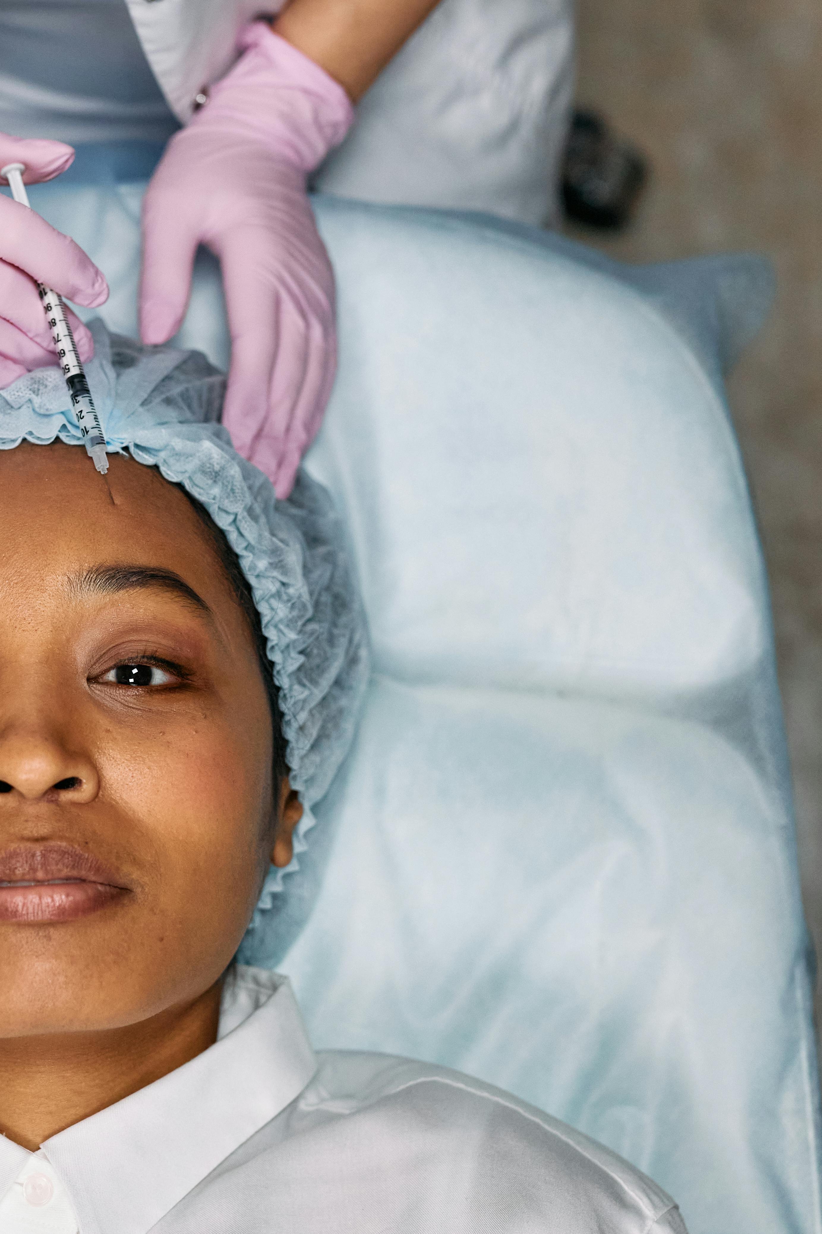 A patient relaxing during a facial skin treatment